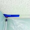 ZipWall Edge Head and non-skid Plate in-use with drop ceiling