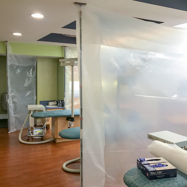 ZipWall® Barriers Separate Treatment Bays in Dental Clinic ZipWall Dust Barrier System